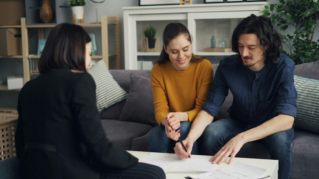 family reviewing insurance paperwork