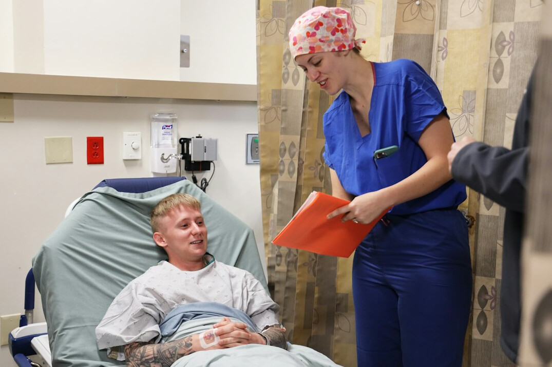 patient talking to billing staff